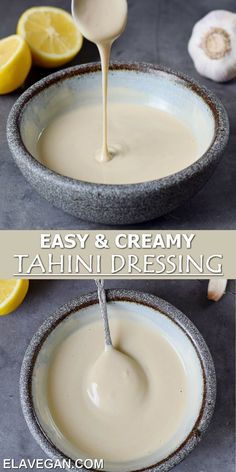 a bowl filled with creamy tahini dressing next to sliced lemons