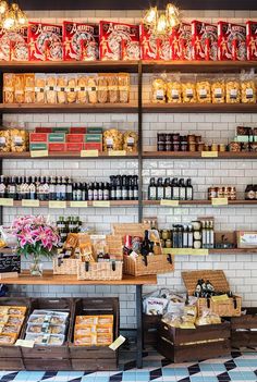 a store filled with lots of different types of food on shelves next to each other