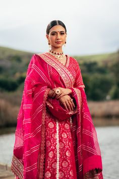 Saba - Fuchsia Pink Brocade Lengha Choli with Embellished Border Grab this quintessential and classy brocade lehenga & allow yourself to cherish the beauty of India's authenticity & culture! Classic designer choli blouse with V-neckline detail Shoulder accentuating V-neckline Fuchsia pink brocade fabric blouse Armhole princess line fitted patterning Sequin adorned ready borderwork Open back design detailed choli Flared brocade skirt lehnga with sequins border Flowy pink fuchsia brocade lehenga G Elegant Pink Anarkali Set For Traditional Ceremonies, Pink Tilla Traditional Wear For Reception, Pink Traditional Wear With Tilla For Reception, Pink Tilla Saree For Traditional Ceremonies, Pink Saree With Tilla For Traditional Ceremonies, Pink Lehenga With Zari Work For Traditional Ceremonies, Elegant Pink Traditional Wear With Tilla Detailing, Elegant Pink Traditional Wear With Tilla, Pink Sharara With Tilla In Traditional Drape