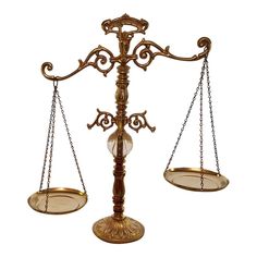 an old fashioned balance scale with two glass balls on it's sides and one light hanging from the base