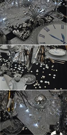 the table is set with silver and black decorations