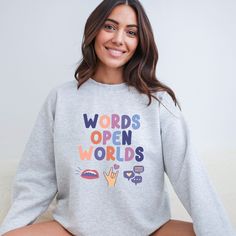 This speech language pathology sweatshirt is the perfect gift for your favorite speech teacher, SLP, or the recent grad! This cozy shirt celebrates the power of words and makes a thoughtful, comfy present. Wrap them in warmth and appreciation for the magic of communication! PRODUCT DETAILS The Gildan 18000 sweatshirt is a heavy blend crewneck sweatshirt made of 50% cotton and 50% polyester. It is available in our shop in a range of sizes from Small to 3XL. Here are some more details about the product: - Medium-heavy fabric (8 oz. per sq. yd.) - Pre-shrunk - Pill-resistant and softer air-jet spun yarn - Double-needle stitching at waistband and cuffs - 1x1 rib with spandex - Quarter-turned to eliminate center crease SIZING *Please note - you should order 1-2 sizes larger than your usual size Speech Language Pathologist Assistant, Speech Language Pathologist Gifts, Speech Teacher, Slp Shirts, Gift For Graduation, Speech Path, Speech Room, Grad Student, Speech Language Pathologist