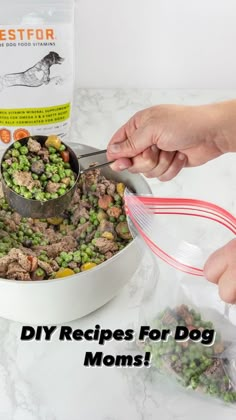 two hands are scooping food out of a dog bowl with the words diy recipes for dog moms