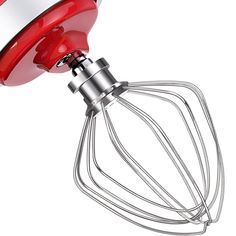 an image of a red mixer being used to make something delicious and tastyy