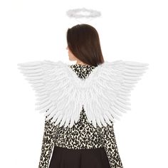 a woman with an angel wings on her back and leopard print shirt over her shoulders