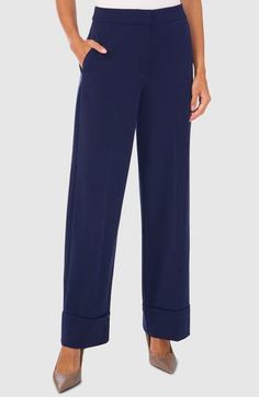 These chic tailored pants are cut with wide legs for a contemporary look, while cuffed hems lend classic polish to the style. 31" inseam; 21 1/2" leg opening; 11 3/4" front rise; 16" back rise Zip fly with hook-and-bar closure Front slant pockets; back welt pockets 68% polyester, 28% rayon, 4% spandex Machine wash, tumble dry Imported Tailored Pants, Wide Legs, Welt Pockets, Bottoms Pants, Leg Pants, Wide Leg Pants, Size 16, Womens Bottoms, Wide Leg