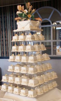 a wedding cake that is stacked on top of each other