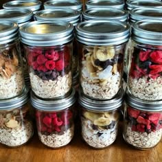 jars filled with food sitting on top of a shelf next to each other in front of the words instant oatmeal jars - easy breakfast meal prep