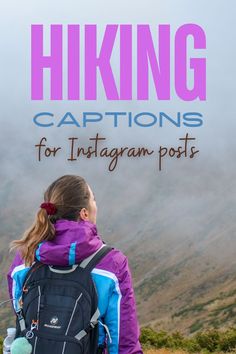 a woman with her back to the camera, looking at mountains and fog in the distance