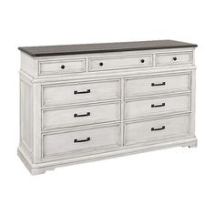 a white dresser with black top and drawers on the bottom, in front of a white background