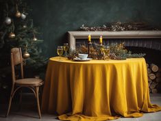 the table is set with two wine glasses and an empty plate on it, next to a fireplace