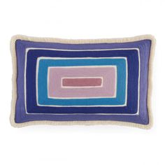 a blue and pink pillow with a rectangular design on it's side, against a white background