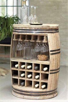 a wine rack made out of an old barrel