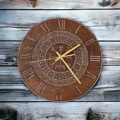 a wooden clock with roman numerals on it