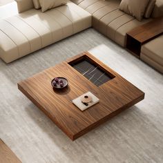 a living room with couches and a coffee table in the middle on carpeted flooring