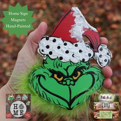 the grin face has been painted on this hand - painted ornament for christmas