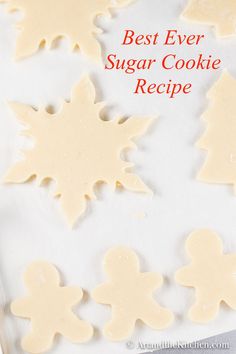 the cookies have been cut into shapes to look like christmas trees and snowflakes