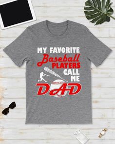 a t - shirt that says, my favorite baseball players call me dad on it