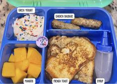 a blue plastic tray filled with food on top of a counter