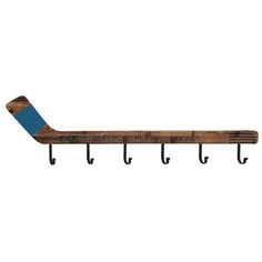 a wooden coat rack with blue handles and hooks hanging from it's sides on a white wall