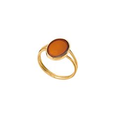 Baltic amber is a stone of happiness and creativity. It's a reminder of warm summer days and a refreshing sea breeze. Put this ring on and enjoy its sunny beauty.  The ring is made of brass, plated with 24-carat gold.  Size of the amber: 14mm length / 10 mm width. The ring was created in a jewellery workshop in Tricity, Poland. The stones which we use are unique. They may differ in colour shading and inclusions in each jewellery piece. The product is nickel-free. Natural stones and precious meta Elegant Amber Cabochon Ring, Elegant Amber Rings For Gifts, Modern Amber Oval Ring, Elegant Oval Amber Rings, Oval Amber Cabochon Ring, Amber Oval Cabochon Rings, Elegant Amber Oval Rings, Elegant Baltic Amber Rings As Gift, Elegant Baltic Amber Rings For Gifts