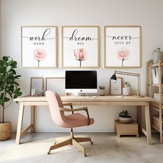 a desk with a computer and two posters on the wall above it that says work, dream, big give up