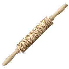 a wooden rolling pin with floral designs on it