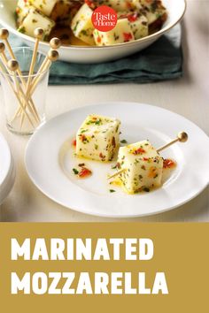 there is a plate with food on it and the words marinated mozzarella