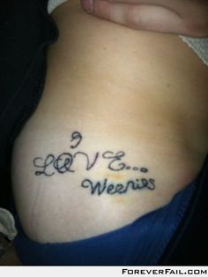 a woman's stomach with the word love written in cursive writing