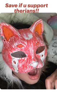 a woman wearing a red mask with an orange fox on it's face and the words save if u support their fans