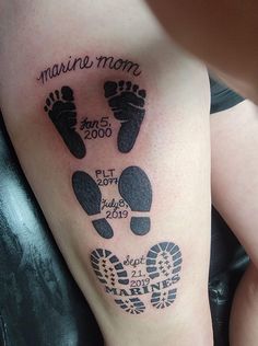 a woman with a tattoo on her leg that says marine mom and footprints