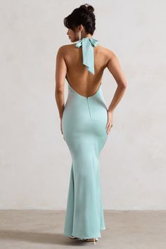 Exude confidence at your next event in this show-stopping maxi. Unbeatable. Arriving in a soft mint green hue of a premium satin. this backless piece features a cross over halter-neck thats finished with wide self-tie straps for the perfect custom fit. For an elegant bridesmaid attire. try styling yours with our Just A Fling court shoes. Features - Premium satin- Cross over halter neckline- Open back- Invisible zip closure - Fishtail skirt- Maxi length Sizing & Fit Model is 5'8 and wears UK size