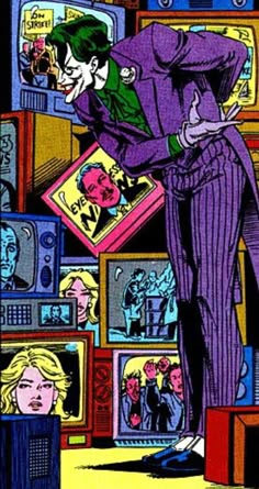 the joker is standing in front of televisions and looking at his face with an open mouth