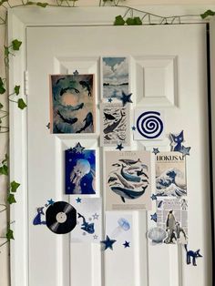 a white door covered in pictures and magnets next to a wall with ivy growing on it