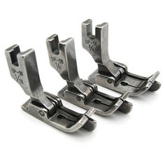 three pairs of metal clamps sitting on top of each other