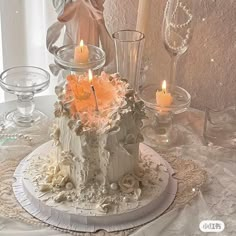 there is a cake on the table with candles