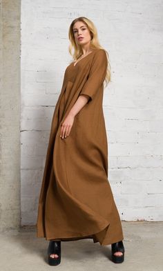 Oversized Brown Dresses For Daywear, Brown Oversized Dress For Daywear, Oversized Brown Dress For Daywear, Solid Color Pleated Relaxed Fit Dresses, Full Length Beige Dress For Spring, Beige Full Length Dress For Spring, Elegant Oversized Maxi Dress, Beige Full-length Dress For Spring, Elegant Oversized V-neck Maxi Dress