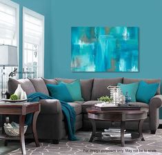 a living room filled with furniture and blue walls