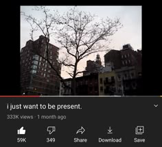 an image of a tree in the middle of a city with no leaves on it