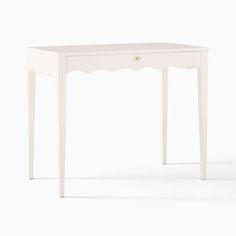 a small white table with a drawer on it's top and legs, in front of a white background