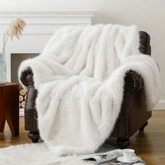 a chair with a white blanket on top of it