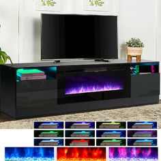 an entertainment center with colorful lights on the front and side panels, including a flat screen tv