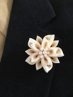 "Men's lapel pin. The lapel pin is made out of satin and organza ribbons in the Japanese kanzashi technic. The flower measures approx. 2.5\" across.  This listing is for one lapel pin in IVORY color. The lapel pin is handmade with top quality materials and made to last. I craft it from my home studio. Please continue to check out other items in my shop. I love custom orders so please convo me for any questions. Thanks for stopping by!" Classic White Brooches For Formal Occasion, Classic White Brooch For Formal Occasions, Elegant Handmade Flower Pins As Gift, Elegant Cream Brooches For Formal Occasions, Elegant White Pins For Formal Occasions, White Elegant Formal Pins, Elegant Formal Jewelry With Handmade Flowers, Elegant White Formal Pins, Elegant Floral Brooch For Formal Occasions