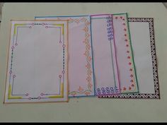 five different colored papers on top of each other with decorative borders and border designs around the edges