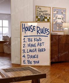 a house rules sign in front of a wooden table