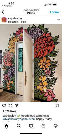 an open door with flowers painted on it and the caption says, i'm glad