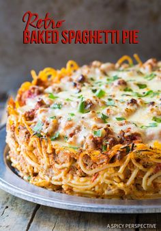 a baked spaghetti pie on a plate with the words retro baked spaghetti pie above it