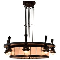 a chandelier with five lights hanging from it