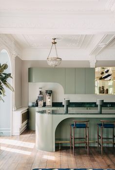 the kitchen is clean and ready to be used as a dining room or office space