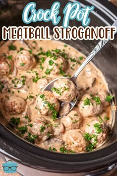 crock pot meatball stroganoff in a slow cooker with a spoon